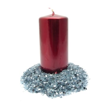 Red candle on blue rhinestones