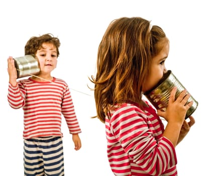 two kids talking on a tin phone