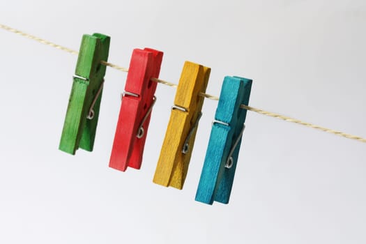 four colorful hangers