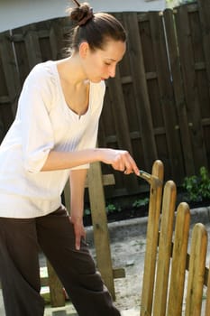 Woman Painted Fence