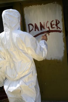 Danger sign on the wall