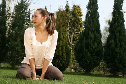 Woman sitting in the garden