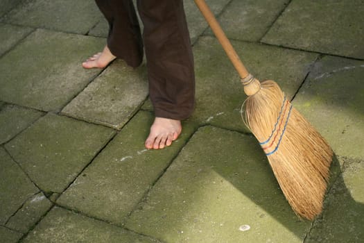 Sweeping with brooms
