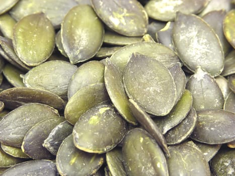 Several pumpkin seeds in close-up