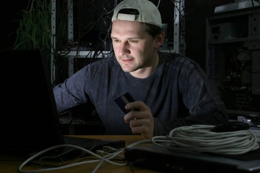 Computer hacker with credit card