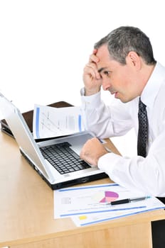 Businessman at his desk on white background