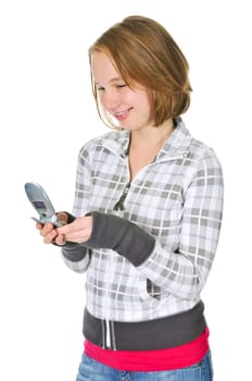Teenage girl text messaging on a cell phone