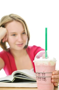 Teenage girl with milkshake
