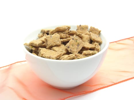 A bowl of chinaware filled with dog cookies