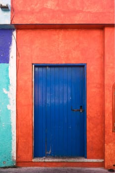 Blue Door and Colorful Walls