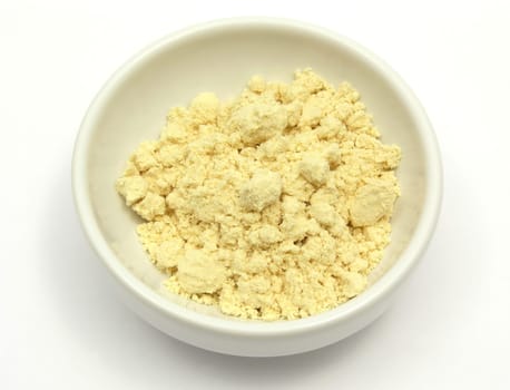 Soy flour in small white bowl