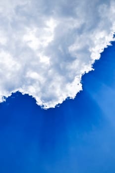 Blue sky with sunrays