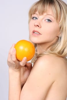 smiling woman with orange
