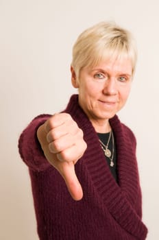 mature woman thumbs down