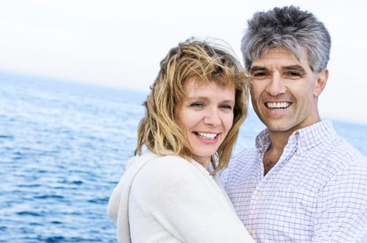 Mature romantic couple at seashore