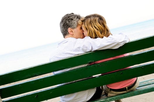 Mature romantic couple on a bench