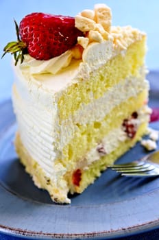 Slice of strawberry meringue cake