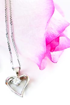 Diamond necklace on rose