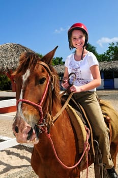 Girl riding horse