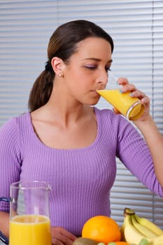 Woman wants to drink orange juice