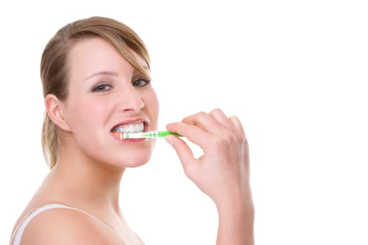 Young woman brushing her teeth