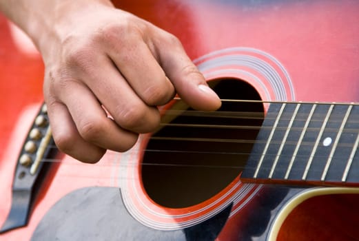 Playing guitar