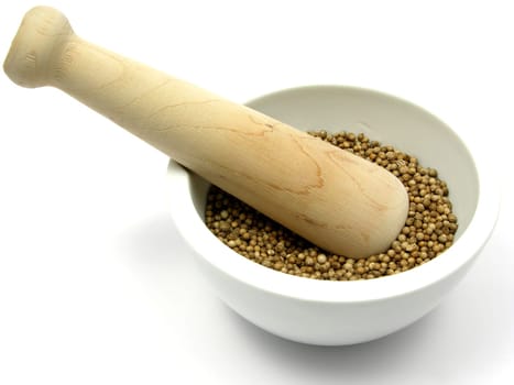 Dried coriander in porcelain peel