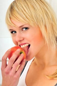 Woman eating an apple
