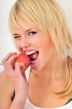 Woman eating an apple