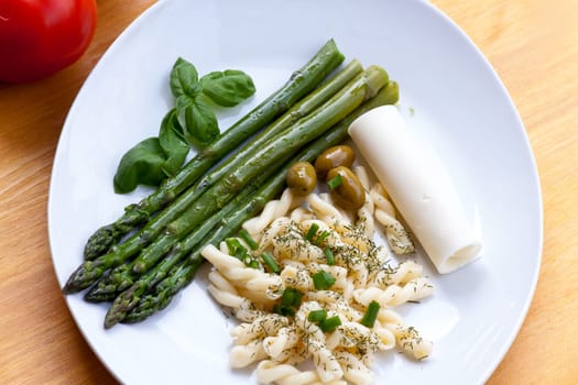 Green asparagus with pasta,olives,cheese