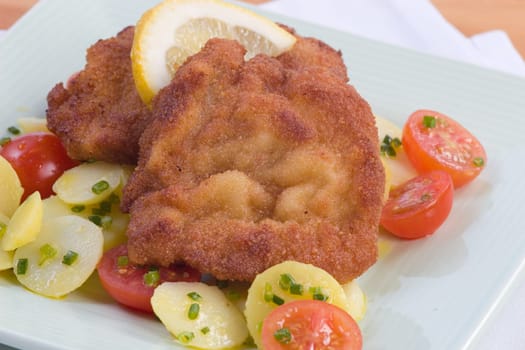 Chop with tomatoes