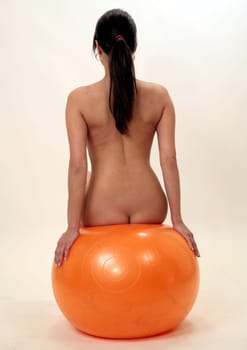 Woman with sitting ball