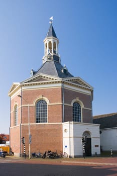 Dutch village church in april sun