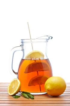 Ice tea with lemon pitcher