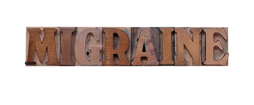 migraine in old ink-stained wood type