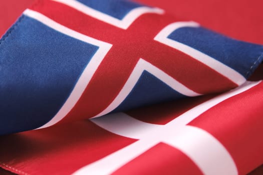 curved flags of Iceland and Denmark