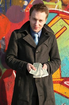 Man shows a lot of money
