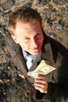 Man showing stack of money