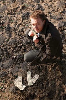 Man hiding money