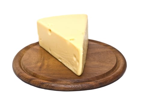 Cheese on wooden board