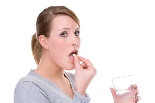 Young woman with tablet and glass of water