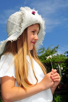 Girl with flower and hat