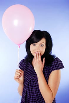 Young woman with balloon
