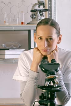 scientist with microscope