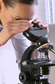 Scientist with Microscope