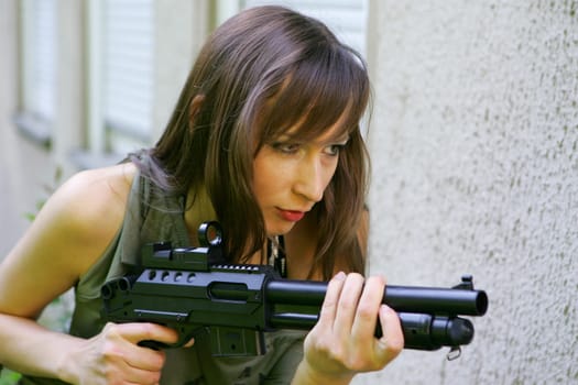 woman with gun