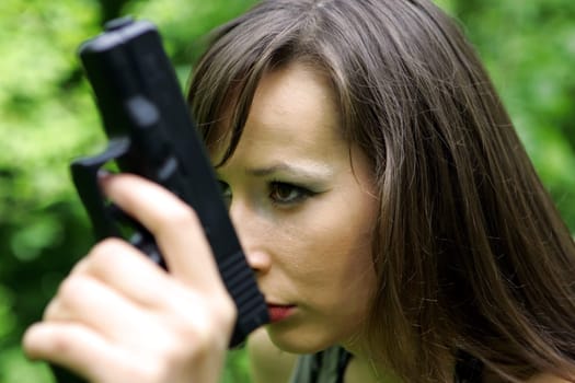 woman with gun