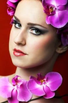Woman with orchids