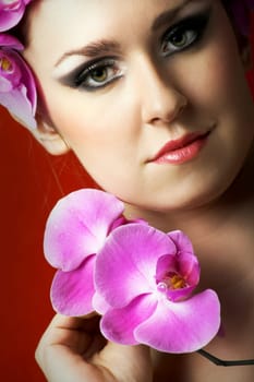 Woman with orchids