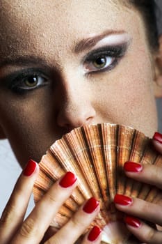 Woman with seashell